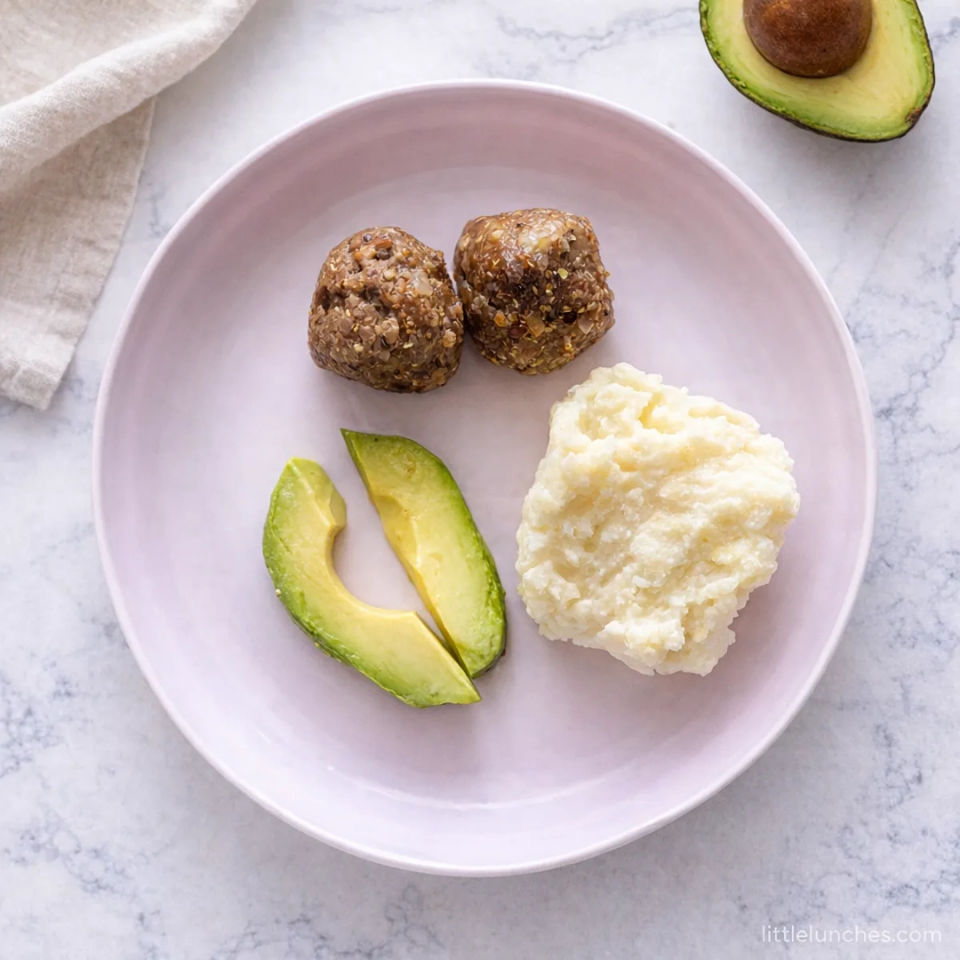Lamb meatballs with quinoa, mashed potatoes, and avocado